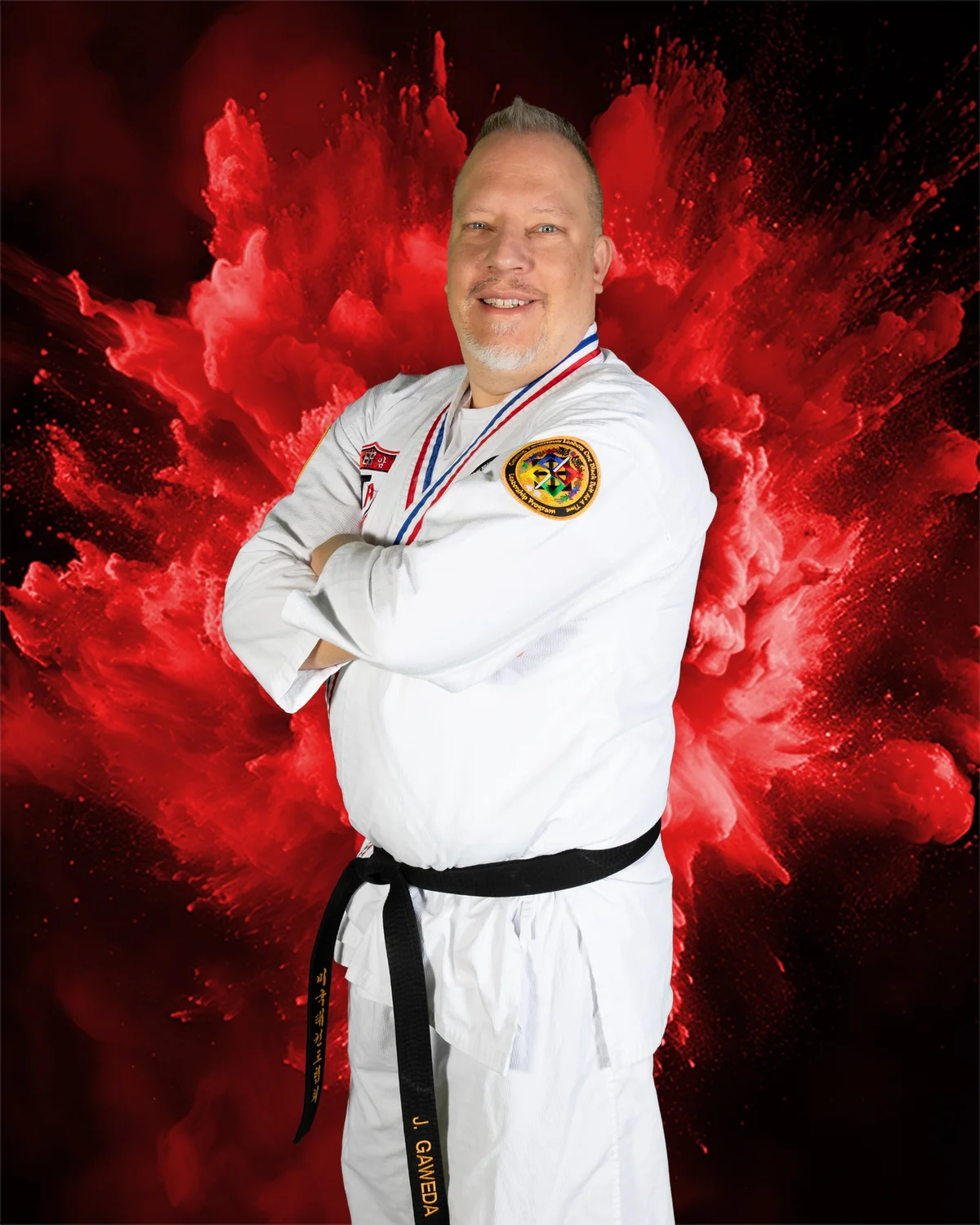 Jan Gaweda in his martial arts uniform, representing discipline and commitment